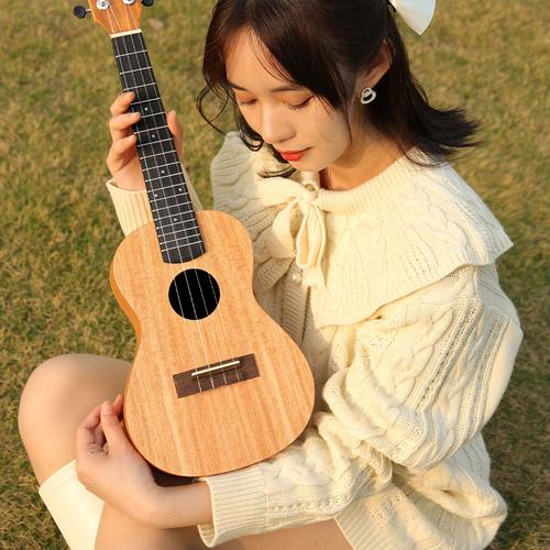 女生适合学尤克里里还是吉他（比较女生学习尤克里里与吉他的适宜性）